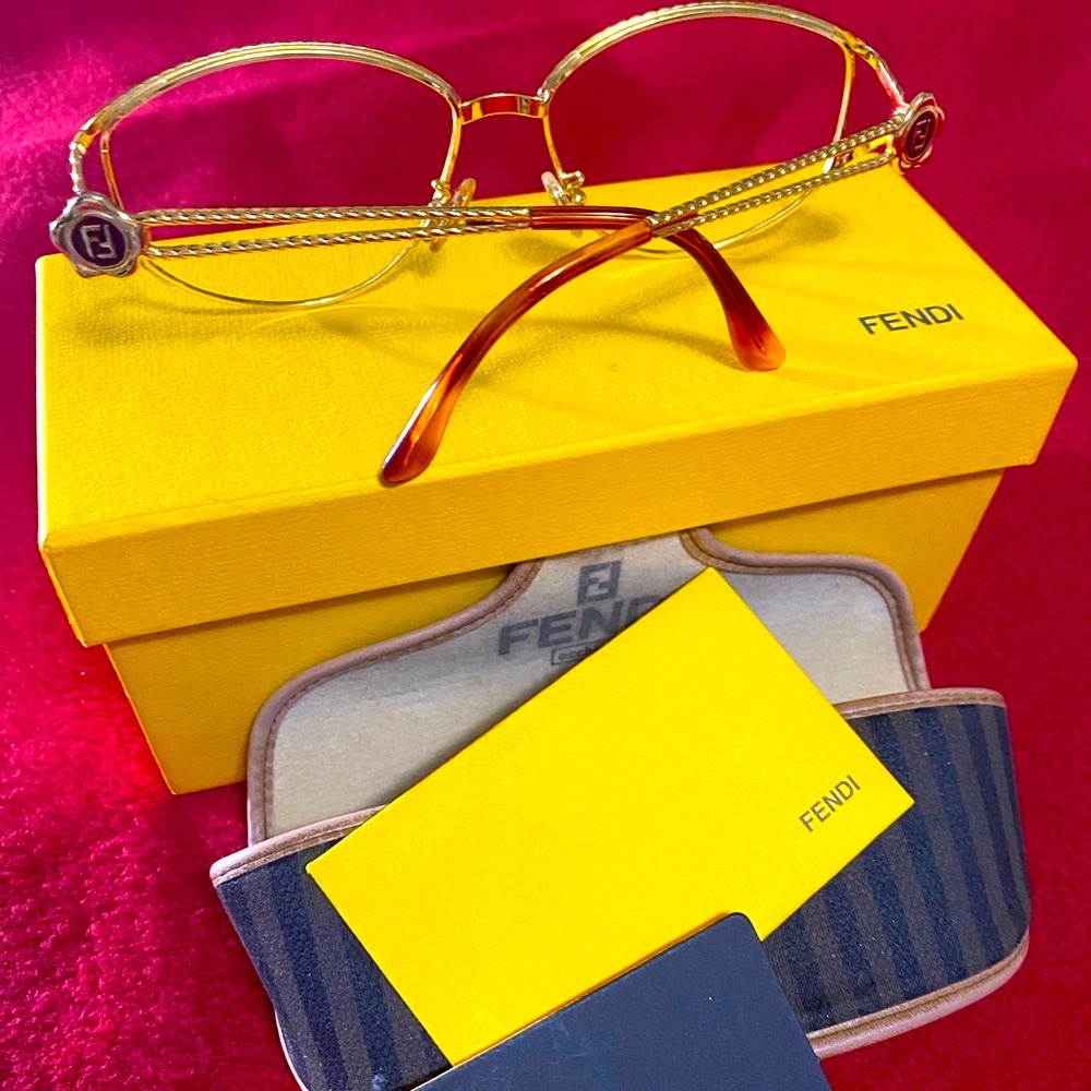 Authentic Vintage FENDI gold tone rope frame. FREE bag with purchase.